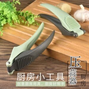 Dual-Use Garlic Press & Ginger Grater