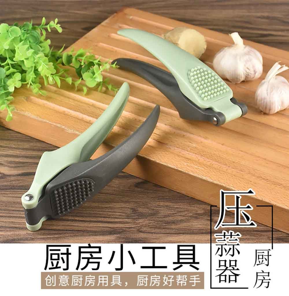 Dual-Use Garlic Press & Ginger Grater